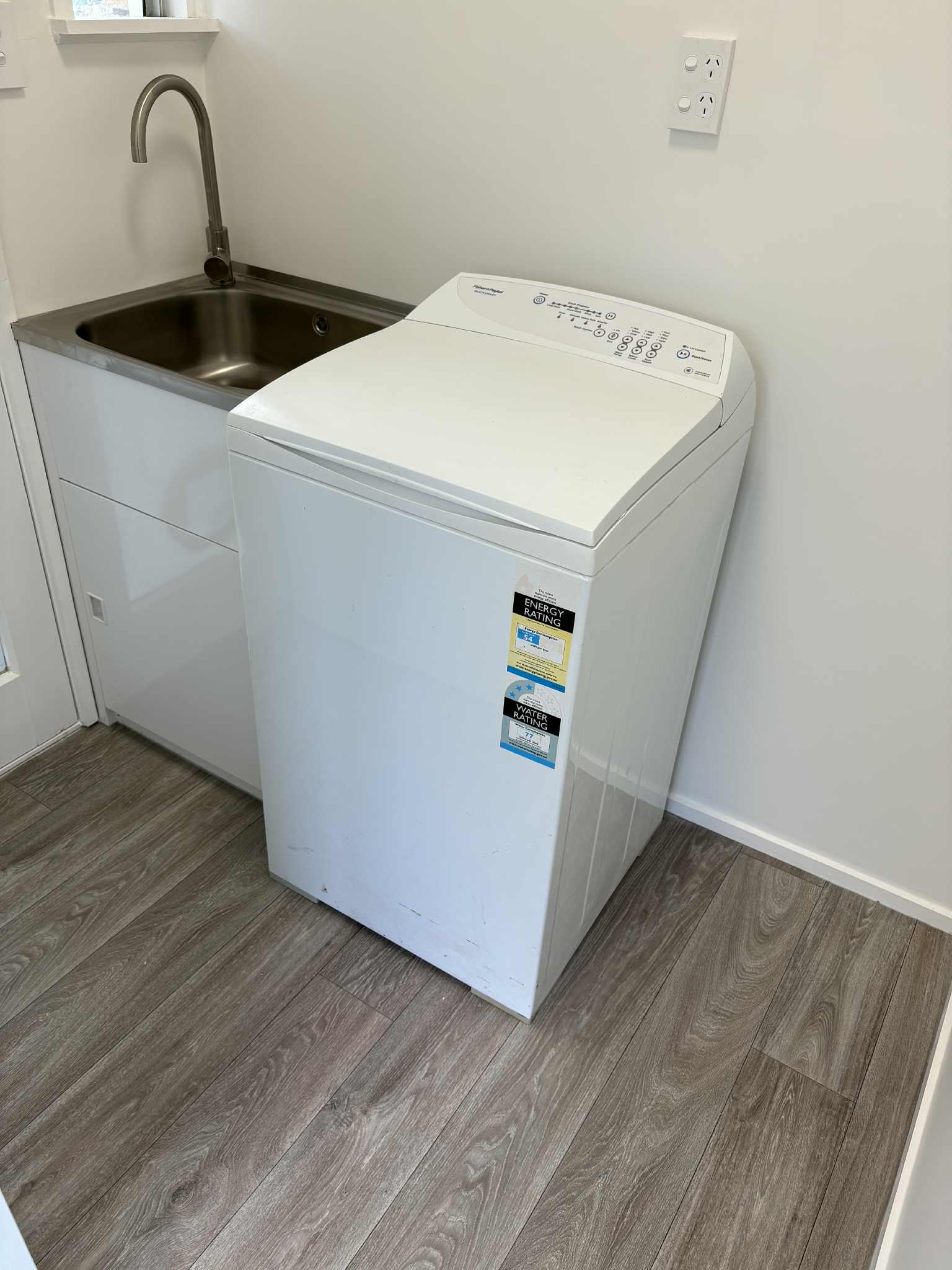 Floor Replacement & Laundry Cabinetry Install